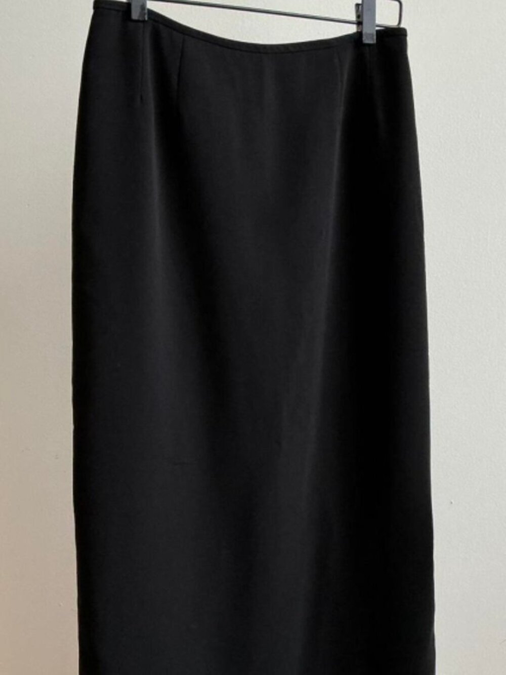 A simple high waisted black straight leg skirt
